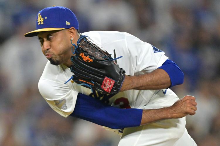 Los Angeles Dodgers pitcher Edwin Diaz (3) delivers to the plate as he earns a save in the ninth inning against the Arizona Diamondbacks at Dodger Stadium on March 27, 2026, in Los Angeles.