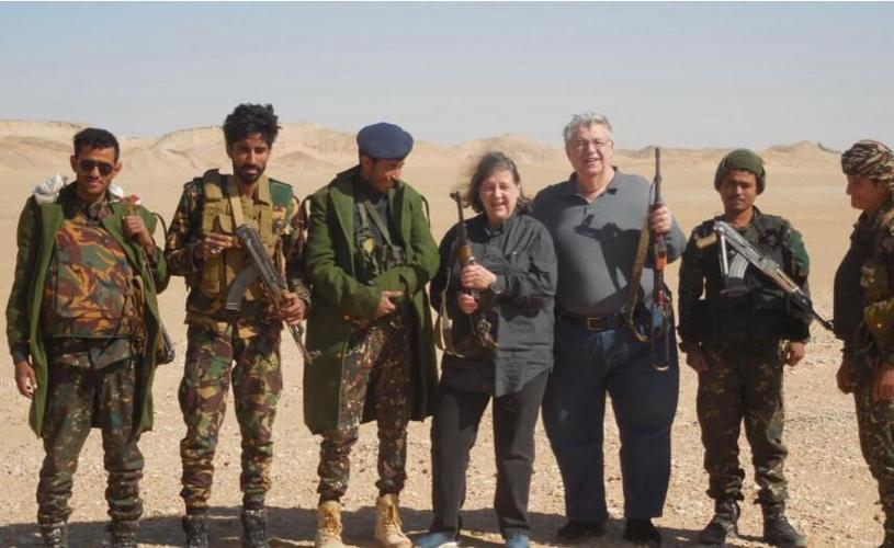 Heavily armed mercenaries shared weapons with the Pennas for a photo while they were driving through Yemen in 2023.