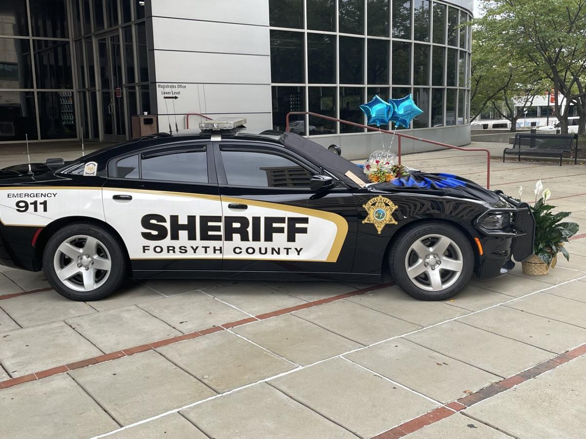 Flowers on patrol car