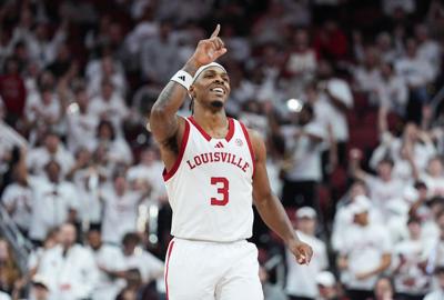Guard Ryan Conwell celebrates after hitting a 3-pointer for Louisville during a game against N.C. State during a game on Feb. 9, 2026.