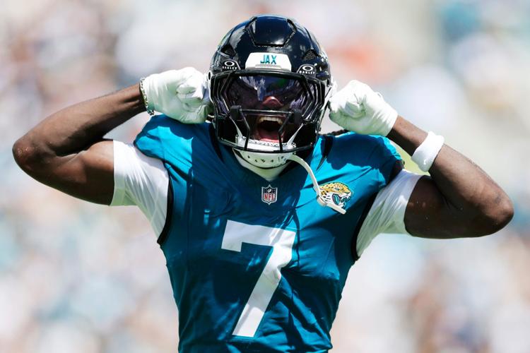 Jacksonville Jaguars wide receiver Brian Thomas Jr. (7) reacts to his reception during the first quarter of an NFL football