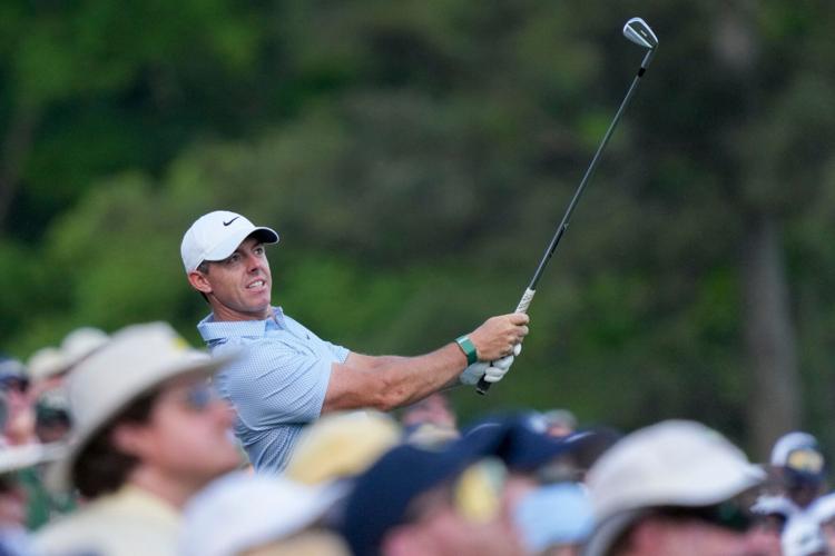 Rory McIlroy tees off on the 12th hole during the final round of the 2026 Masters Tournament at Augusta National Golf Club. Mandatory Credit: Grace Smith-Imagn Images