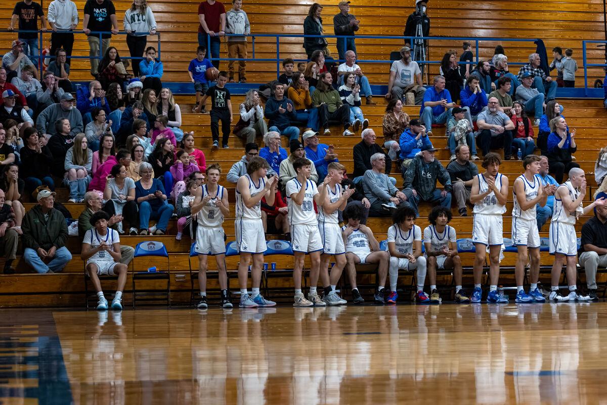 McDowell basketball opens conference play with road wins