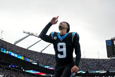 Jan 10, 2026; Charlotte, NC, USA; Carolina Panthers quarterback Bryce Young (9) reflects before an NFC Wild Card Round game at Bank of America Stadium. Mandatory Credit: Bob Donnan-Imagn Images