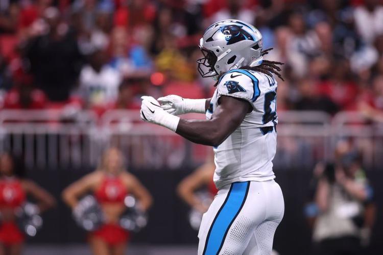 Sep 20, 2026; Atlanta, Georgia, USA;  Carolina Panthers linebacker Devin Lloyd (55) reacts after a sack during the second quarter against the Atlanta Falcons at Mercedes-Benz Stadium.  Mandatory Credit: Brett Davis-Imagn Images