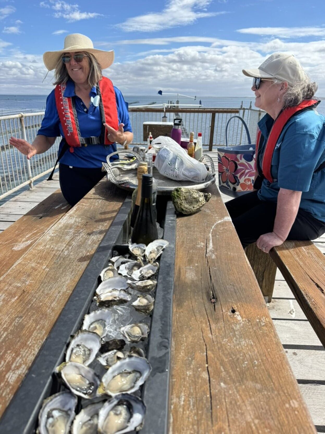 SA Premium Oysters offers a tour that takes guests on a boat to an elevated dining platform overlooking its oyster farm in Smoky Bay.