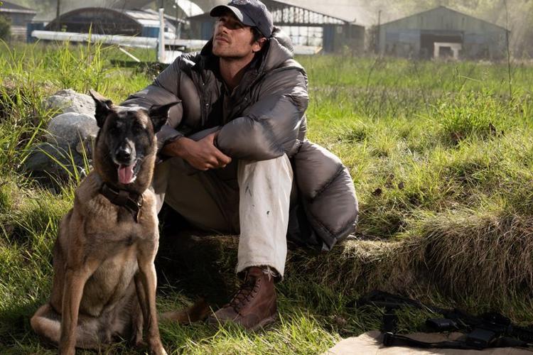 Hig (Jacob Elordi) hangs wth his dog Jasper in the post-apocalyptic drama "The Dog Stars."