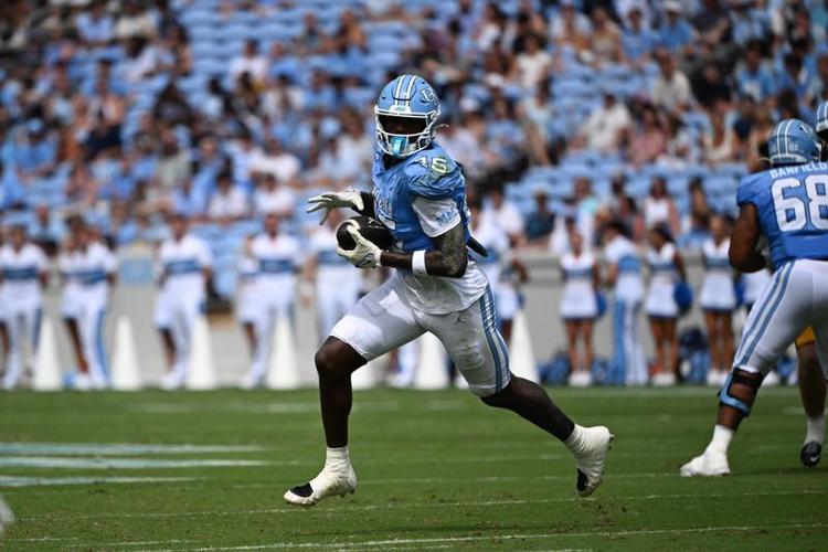 Sep 12, 2026; Chapel Hill, North Carolina, USA; North Carolina Tar Heels tight end Jelani Thurman (45) with the ball in the first quarter at Kenan Stadium. Mandatory Credit: Bob Donnan-Imagn Images
