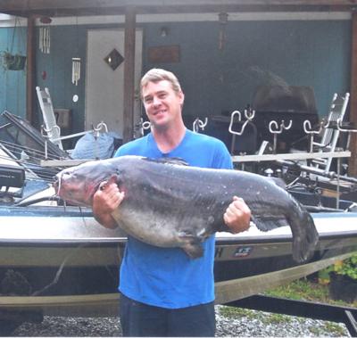 catfish smith ervin james lake lands record near mcdowellnews ounce pound hefts behemoth caught tuesday he last blue