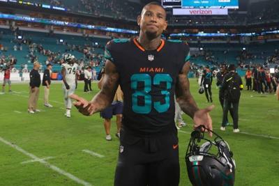 Sep 29, 2025; Miami Gardens, Florida, USA; Miami Dolphins tight end Darren Waller (83) reacts after the game against the New York Jets at Hard Rock Stadium. Mandatory Credit: Sam Navarro-Imagn Images