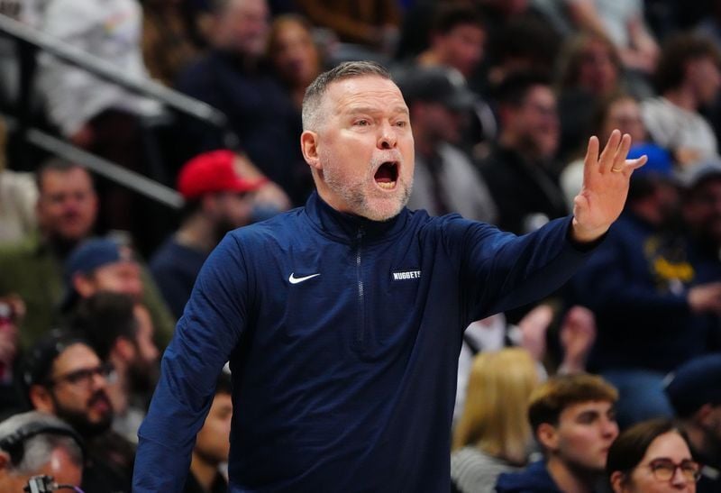 Jan 10, 2025; Denver, Colorado, USA; Denver Nuggets head coach Michael Malone calls out the second half against the Brooklyn Nets at Ball Arena. Mandatory Credit: Ron Chenoy-Imagn Images