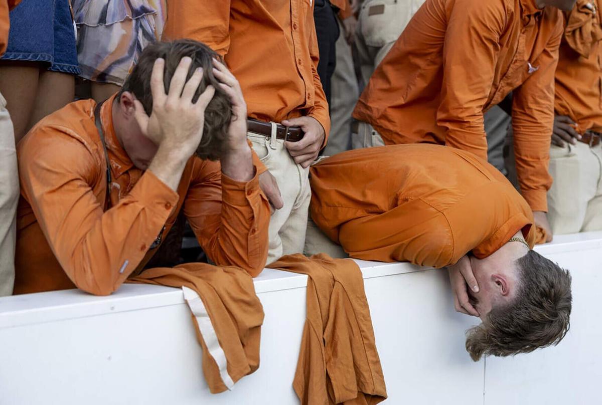 Texas fans react after an Oklahoma touchdown during the second half of the Red River Rivalry at the Cotton Bowl on Saturday, Oct. 10, 2026, in Dallas.