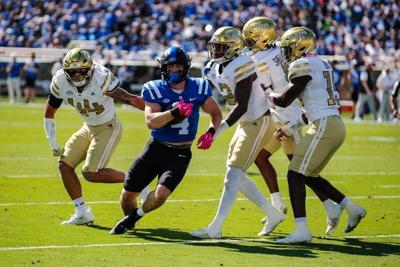 Oct 18, 2025; Durham, North Carolina, USA; Duke Blue Devils running back Anderson Castle (4) runs with the ball during the first half of the game against Georgia Tech Yellow Jackets at Wallace Wade Stadium. Mandatory Credit: Jaylynn Nash-Imagn Images