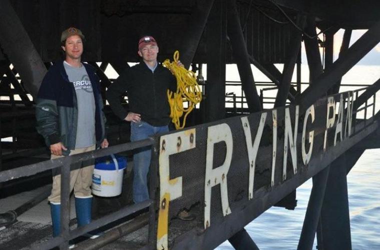 A view of the signage on the side of Frying Pan Tower, which sits 32 miles off the coast of North Carolina and was built as a light station by the U.S. Coast Guard in 1964 to warn mariners of the dangers of Frying Pan Shoals.