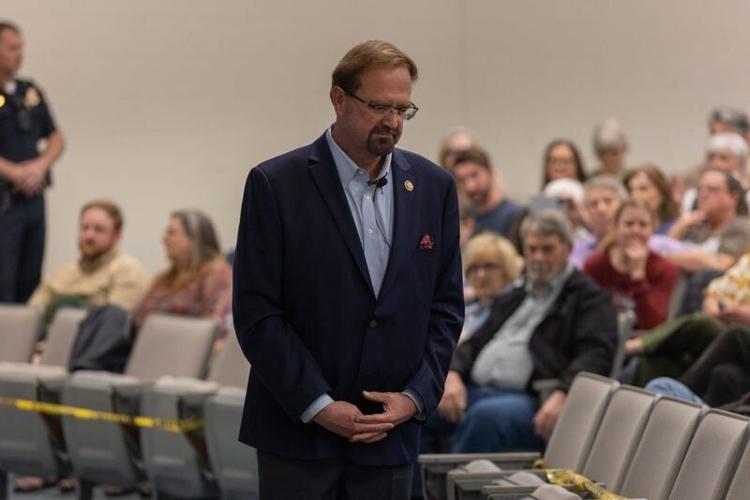 Congressman Chuck Edwards took questions from the crowd during a town hall on March 13, 2025 at A-B Tech’s Ferguson Auditorium in Asheville.