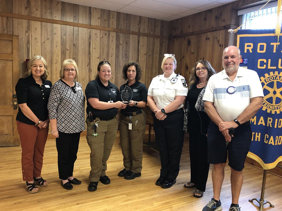 Winners of Battle of the Badges honored at Rotary Club meeting