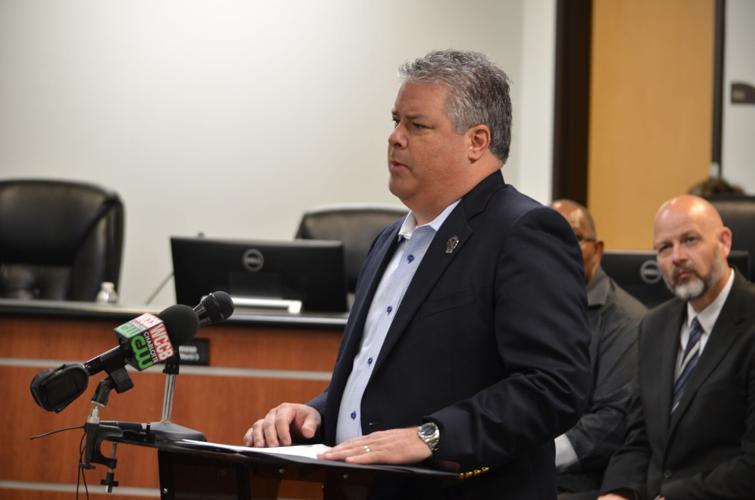 Mooresville Mayor Chris Carney speaks during Mooresville's National Police Week Ceremony in Mooresville on Wednesday. (copy)