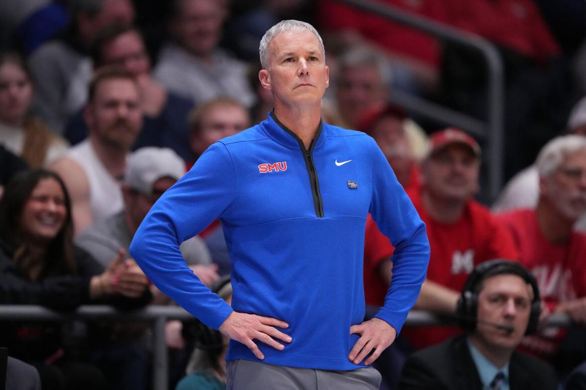 SMU head coach Andy Enfield reacts during the second half against Miami in the First Four game of the NCAA Tournament at UD Arena on March 18, 2026, in Dayton, Ohio.