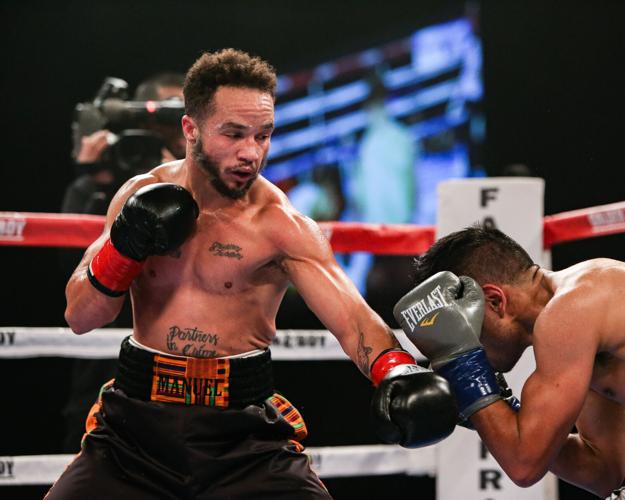 Patricio Manuel, left, posted a unanimous decision victory over Hugo Aguilar in the 128-pound super featherweight division bout Saturday night, Dec. 8, 2018, at Fantasy Springs Casino in Indio, California. Manuel became the first transgender male to com...