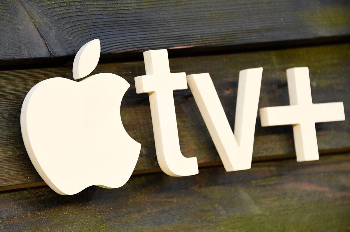 The Apple TV+ logo is seen on the backdrop for the red carpet arrivals of "The Last Days of Ptolemy Grey" premiere at the Bruin Theatre in Los Angeles on March 7, 2022.