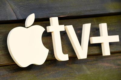 The Apple TV+ logo is seen on the backdrop for the red carpet arrivals of "The Last Days of Ptolemy Grey" premiere at the Bruin Theatre in Los Angeles on March 7, 2022.
