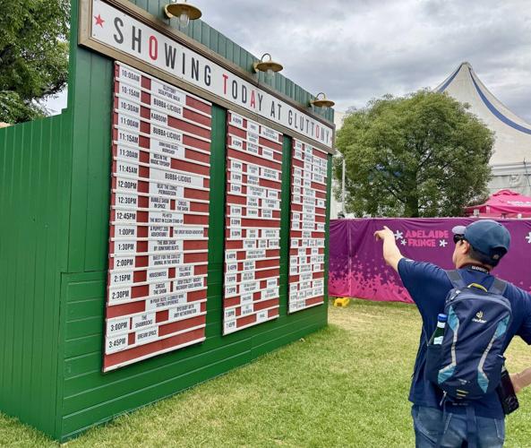A board shows a long list of performances at one of several venues at Adelaide Fringe, the biggest arts festival in the Southern Hemisphere.