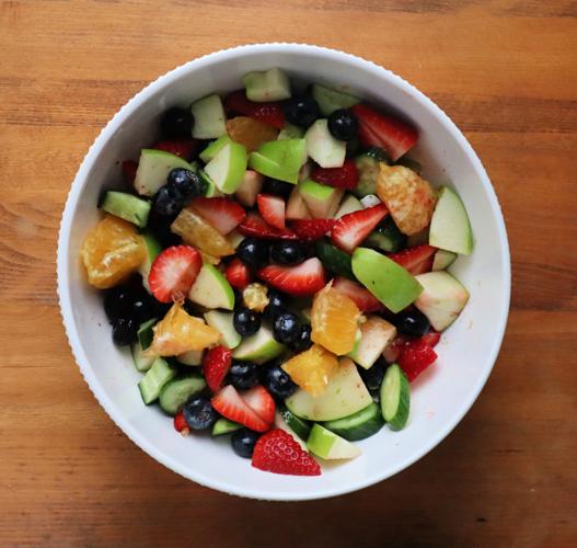 Eating a salad comprised of fruits with high water content is an easy way to stay hydrated.