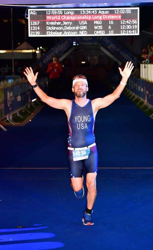 The long run: Former Titan wrestler competes in world triathlon championships - with some help from his old coach