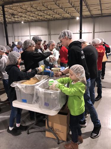 Organizer: Friday’s food-packing event was a big success