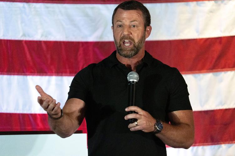 Homeland Security Secretary Markwayne Mullin speaks during the ÒTriple M TailgateÓ campaign event Sept. 12, 2026 at the