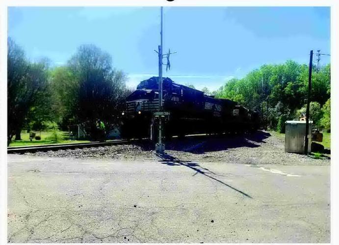 Test train travels through Old Fort on repaired tracks once damaged in hurricane