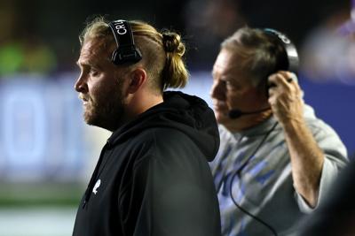 Defensive coordinator Steve Belichick, left, and head coach Bill Belichick of the North Carolina Tar Heels look on during the second half of the game against the TCU Horned Frogs at Kenan Stadium on Sept. 1, 2025, in Chapel Hill, North Carolina.