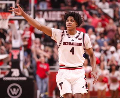 Texas Tech's Christian Anderson reacts to hitting a 3-pointer against Cincinnati during a Big 12 Conference men's basketball game, Tuesday, Feb. 24, 2026, in United Supermarkets Arena.