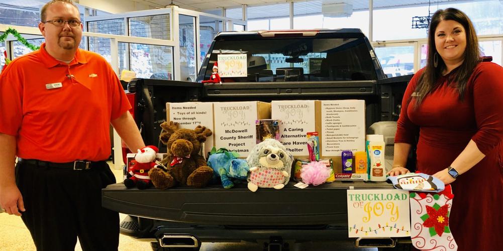 Jim Cook Chevrolet collecting toys, household items