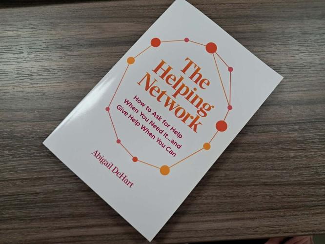 01xx26-hdr-news-girlscoutbook-p2