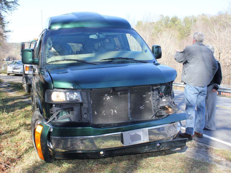 Three hurt in two-car collision