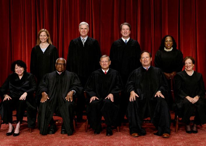 FILE PHOTO: U.S. Supreme Court justices pose for their group portrait at the Supreme Court in Washington