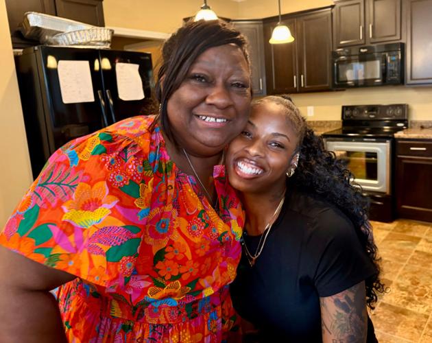 Donna Neal poses with her foster daughter, Niyjae Christensen, 19, who is one of 91 teen girls Neal has fostered since 2010, in Neal's home April 13, 2026, in Hendersonville, Tennessee.
