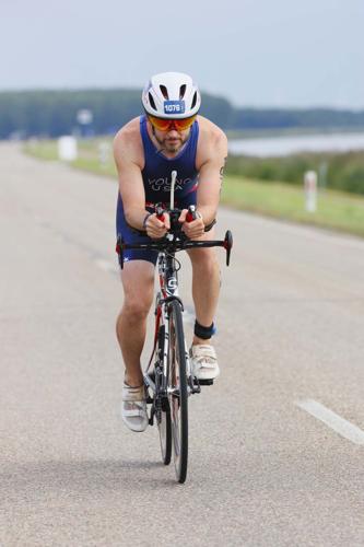 The long run: Former Titan wrestler competes in world triathlon championships - with some help from his old coach