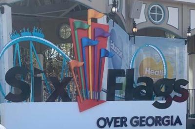 The signage for Six Flags Over Georgia is seen in 2021.