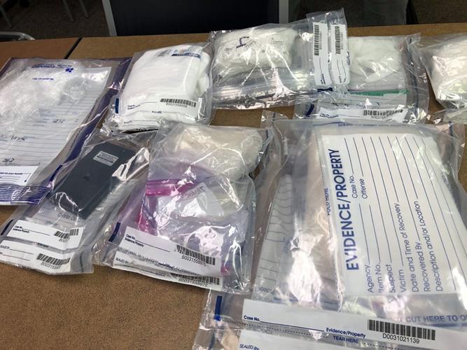 Seized: Pounds of meth, heroin : Federal fugitive search leads to drug trafficking charges