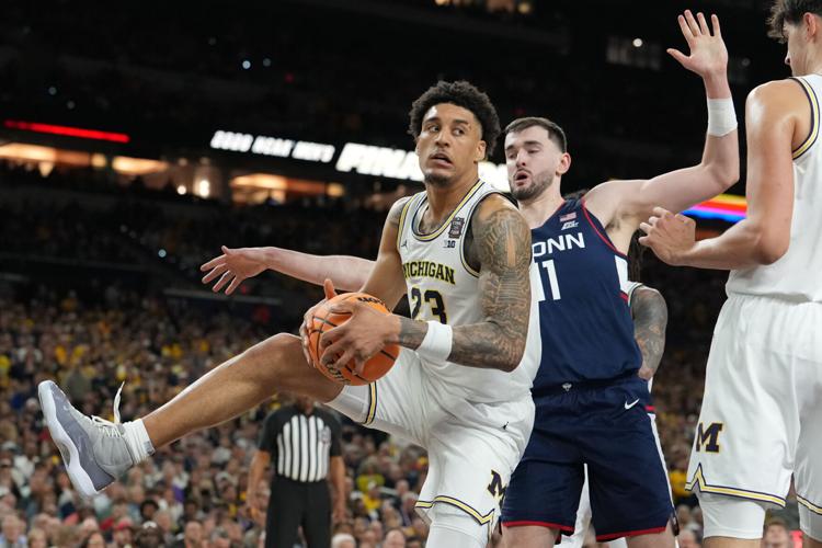 NCAA UConn Michigan Basketball