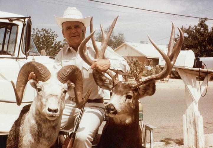Branham with sheep and deer trophies