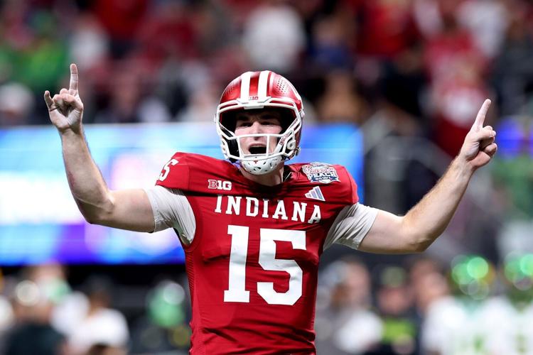 Indiana quarterback Fernando Mendoza calls a play against Oregon during the second quarter in a College Football Playoff semifinal at the Chick-fil-A Peach Bowl at Mercedes-Benz Stadium on Friday, Jan. 9, 2026, in Atlanta.