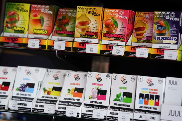 FILE PHOTO: Flavored vape cartridges are pictured for sale at a shop in Atlanta