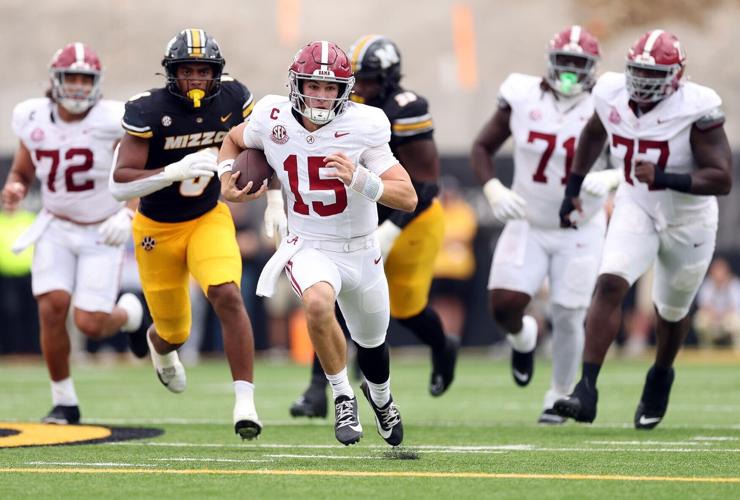 Alabama quarterback Ty Simpson scrambles during the first half against Missouri at Faurot Field at Memorial Stadium on Saturday, Oct. 11, 2025, in Columbia, Missouri.