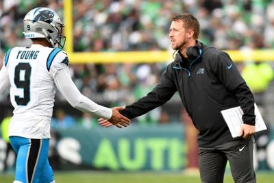 Dec 8, 2024; Philadelphia, Pennsylvania, USA; Carolina Panthers quarterback Bryce Young (9) and offensive coordinator Brad Idzik against the Philadelphia Eaglesat Lincoln Financial Field. Mandatory Credit: Eric Hartline-Imagn Images
