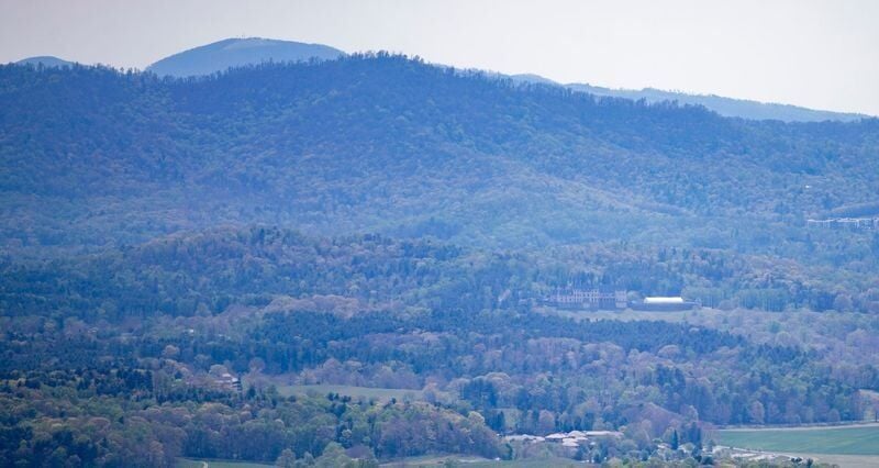 A view from Deaverview Mountain shows the Biltmore Estate in the distance in Asheville, N.C., on Monday, April 13, 2026. Buncombe County recently closed on the 342-acre property, which is slated to become a public park.