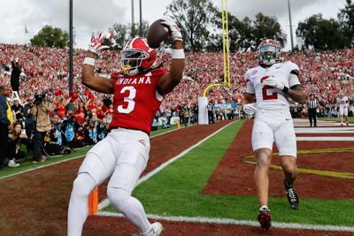 Indiana Hoosiers wide receiver Omar Cooper Jr. celebrates after a touchdown reception in front of Alabama Crimson Tide defensive back Zabien Brown during the second quarter of the College Football Playoff Rose Bowl game at the Rose Bowl on Thursday, Jan...