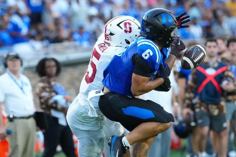 Sep 19, 2026; Durham, North Carolina, USA;  Stanford Cardinal cornerback Jay Green (5) breaks up the pass attempt to Duke Blue Devils wide receiver Jonah Burton (6) during the second half at Wallace Wade Stadium.  Mandatory Credit: James Guillory-Imagn ...